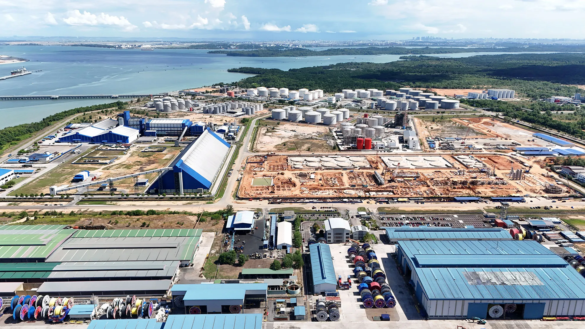 Drone view of Tanjung Langsat Port jetties and industrial waterfront